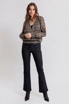 Pantalon noir coupe flare enduit effet cuir | Elora